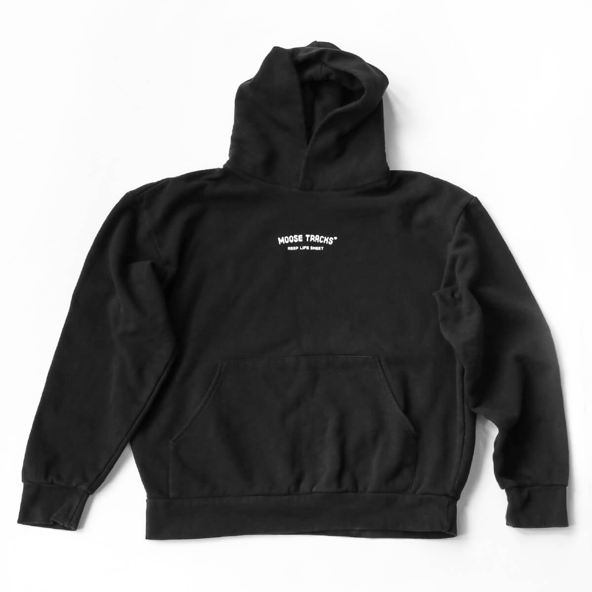 A black hoodie on a white surface that reads, "Moose Tracks Keep Life Sweet" across the chest in white letters.