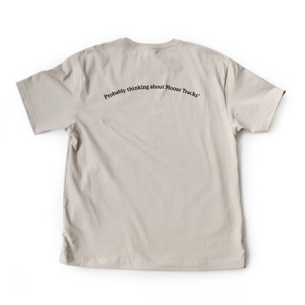 A light-colored t-shirt with, "Probably thinking about Moose Tracks" printed on the back.